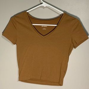 Yellow cropped shirt